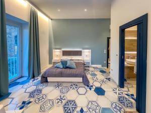 Llit o llits en una habitació de MaisonVenere