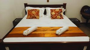 Postel nebo postele na pokoji v ubytování Ovenro Hotel Yala, Kataragama + 71 fotografií