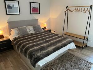 Кровать или кровати в номере Les 4 Elements