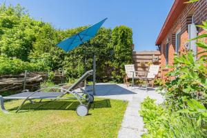 En have udenfor Indivuduelle-Ferienwohnung-Mien-Kajuet