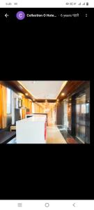 a view of a living room with a white table at Hotel paladise in Ahmedabad