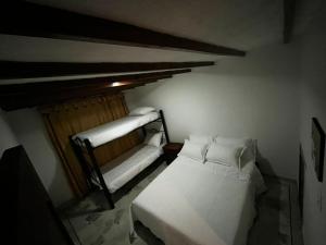 Postel nebo postele na pokoji v ubytování Tikki Lua + 4 fotografie