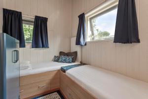 Кровать или кровати в номере Bosje 1 - Ouddorp NOT INTENDED FOR COMPANY OR WORK-RELATED STAYS