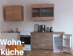 Кухня или мини-кухня в tillis ferienwohnung teschendorfersee
 +6 фотографий