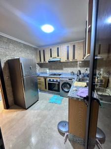 Η κουζίνα ή μικρή κουζίνα στο Résidence Macha'allah