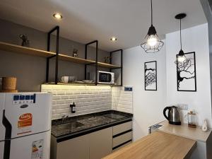 Kuchyň nebo kuchyňský kout v ubytování Lima alojamiento en Salta para 2