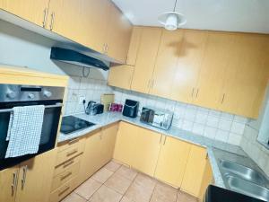 Køkken eller tekøkken på Palms Guest House