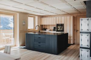 Kuchyň nebo kuchyňský kout v ubytování Ferienhaus Halwina hideaway