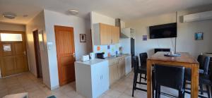 Η κουζίνα ή μικρή κουζίνα στο T2 Alba Rossa n 141 Confort, Panorama Mer Incroyable +45 φωτογραφίες