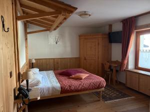 Ένα ή περισσότερα κρεβάτια σε δωμάτιο στο Alla Frasca Verde