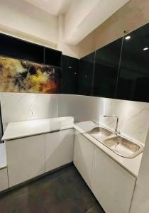 Køkken eller tekøkken på Imperial Infinity Inn