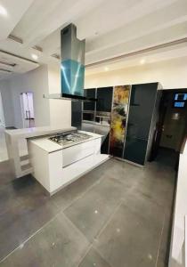 Køkken eller tekøkken på Imperial Infinity Inn