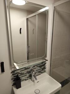 Koupelna v ubytování Appartement vue phare - Emplacement central exceptionnel + 16 fotografií