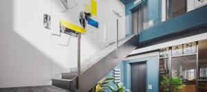 Hotel Ben Marsalforn Affiliated by Meliá في مارسالفورن: درج في جهة المبنى