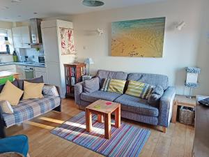 Posezení v ubytování Crab Cottage