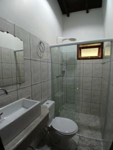 Et badeværelse på Entre Árvores Hoosts Confort