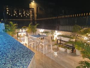 Swimmingpoolen hos eller tæt på Vedic Village aquavilla raivilla