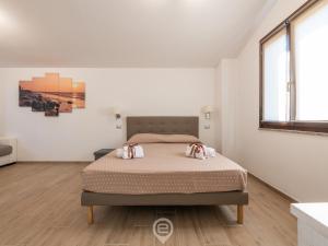 En eller flere senge i et værelse på Villa Monica + 49 billeder