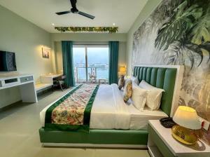 En eller flere senge i et værelse på Lakeside Leisure