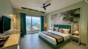 En eller flere senge i et værelse på Lakeside Leisure