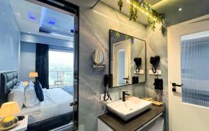 En eller flere senge i et værelse på Lakeside Leisure