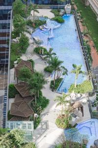 Swimmingpoolen hos eller tæt på Panda Garden Hotel - Apartment