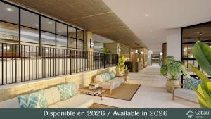 Un vestíbulo con sofás y plantas en un edificio. en Aparthotel Aquasol, en Palmanova