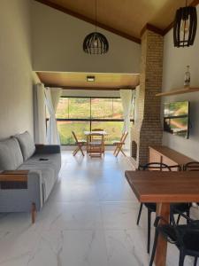 Χώρος καθιστικού στο Estância da Colina Chalet