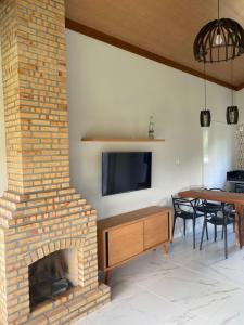 Μια τηλεόραση ή/και κέντρο ψυχαγωγίας στο Estância da Colina Chalet