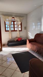 Χώρος καθιστικού στο Jacaraipe ES -Lar de Praia casa temporada