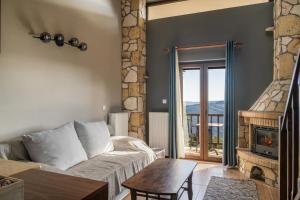 Postel nebo postele na pokoji v ubytování Ξενώνας Θεαλίς