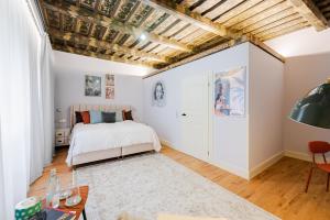 En eller flere senge i et værelse på Bohemia Boutique Hotel Prague