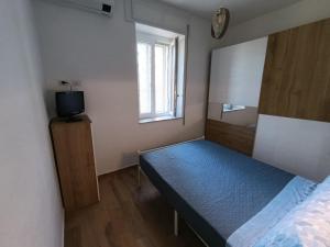 Postel nebo postele na pokoji v ubytování Maison Lydie