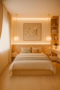 una camera da letto con un letto grande e un tavolo di AL MAS HOMe 