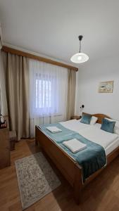 Postel nebo postele na pokoji v ubytování Bed and Breakfast Vijecnica