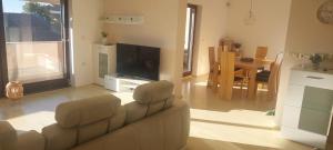 Et tv og/eller underholdning på apartma Kiana