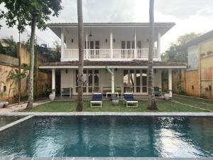 Bazén v ubytování Villa Inlet Galle nebo v jeho okolí