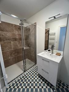 a bathroom with a sink and a shower at Chez Simone et Marguerite in Luzy +58 photos