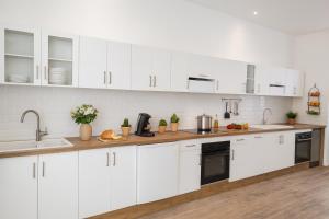 Η κουζίνα ή μικρή κουζίνα στο Chambre colocation