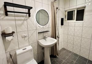 Koupelna v ubytování 東海平行陸貳民宿English Friendly + 44 fotografií