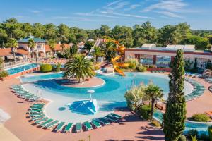 an image of a resort with a water park at Mobile Homes by KelAir at Camping Sylvamar in Labenne