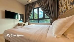 En eller flere senge i et værelse på Sunway Onsen Suite Theme Park View 2BR + 43 billeder