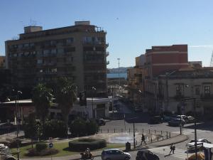 a view of a city with buildings and a street at Loft Marconi Siracusa in Syracuse