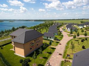 an aerial view of a building next to a body of water at Holiday home in Markkleeberg near a lake in Markkleeberg