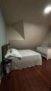 Ένα ή περισσότερα κρεβάτια σε δωμάτιο στο Hotel Pousada do Mel