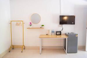 Et tv og/eller underholdning på Lanta Beautiful beach house 2