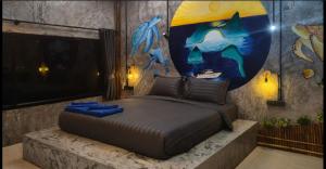 Ένα ή περισσότερα κρεβάτια σε δωμάτιο στο Laeley 1,000 miles resort +4 φωτογραφίες