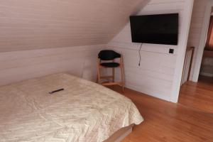 TV a/nebo společenská místnost v ubytování Home Hill