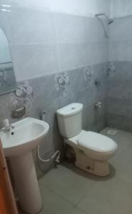 Koupelna v ubytování Hotel Galaxy