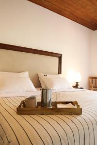 Кровать или кровати в номере Pekoe Bangalow Bambarakanda